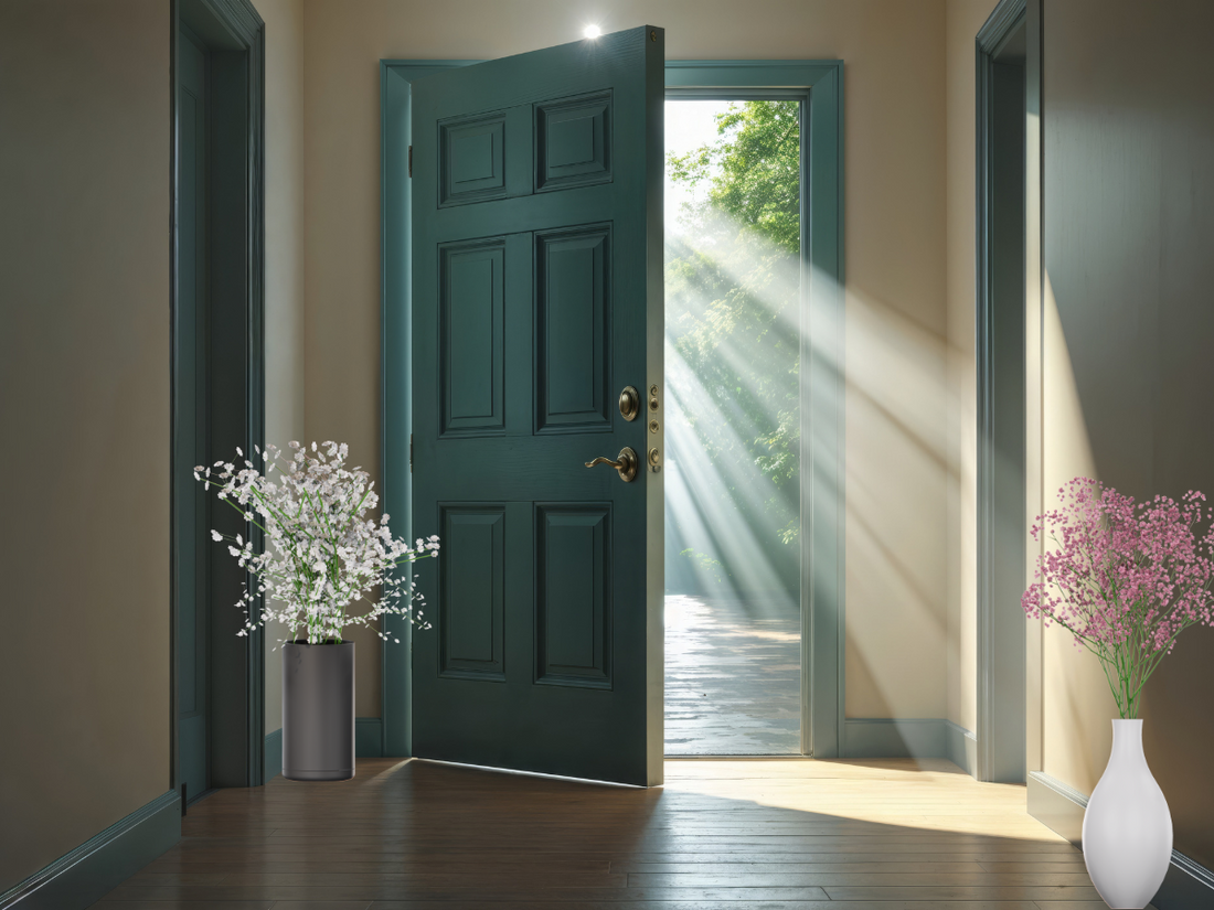 an open door with light streaming through