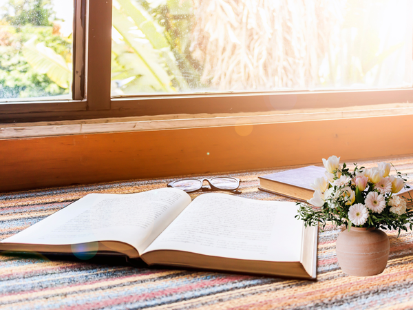 open Bible with soft light—faithfulness over productivity