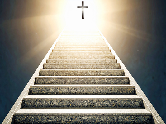 steps leading towards a cross in light